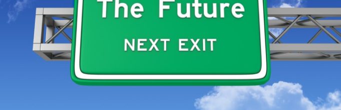 Green traffic sign that says "the future: next exit"