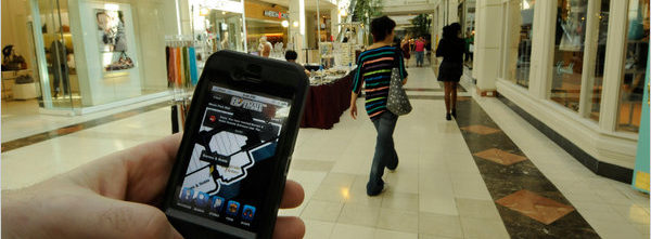 Mobile phone map being used to navigate a mall