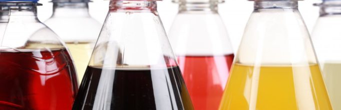 Tops of several soda bottles