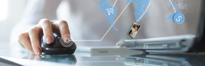 Man using mouse to explore the world with his computer