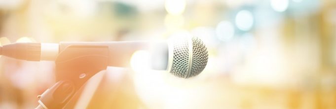 abstract microphone on street walk in the city, pastel and blur
