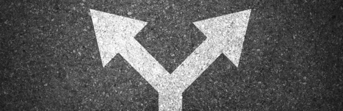 Two arrows pointing opposite directions with shoes on either side of them