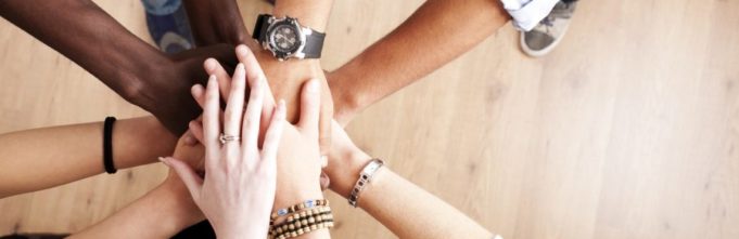 All hands being put in a circle