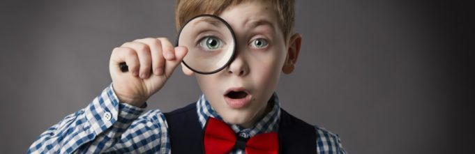 Child See Through Magnifying Glass, Kid Eye Looking with Magnifier Lens, Gray Background