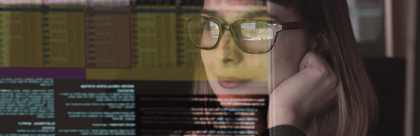 woman looking at media buying computer imagery