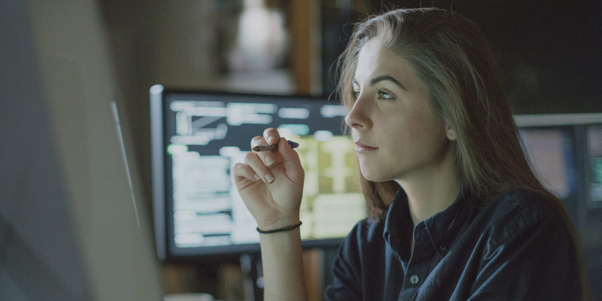 girl staring at computer screen looking at ad buying