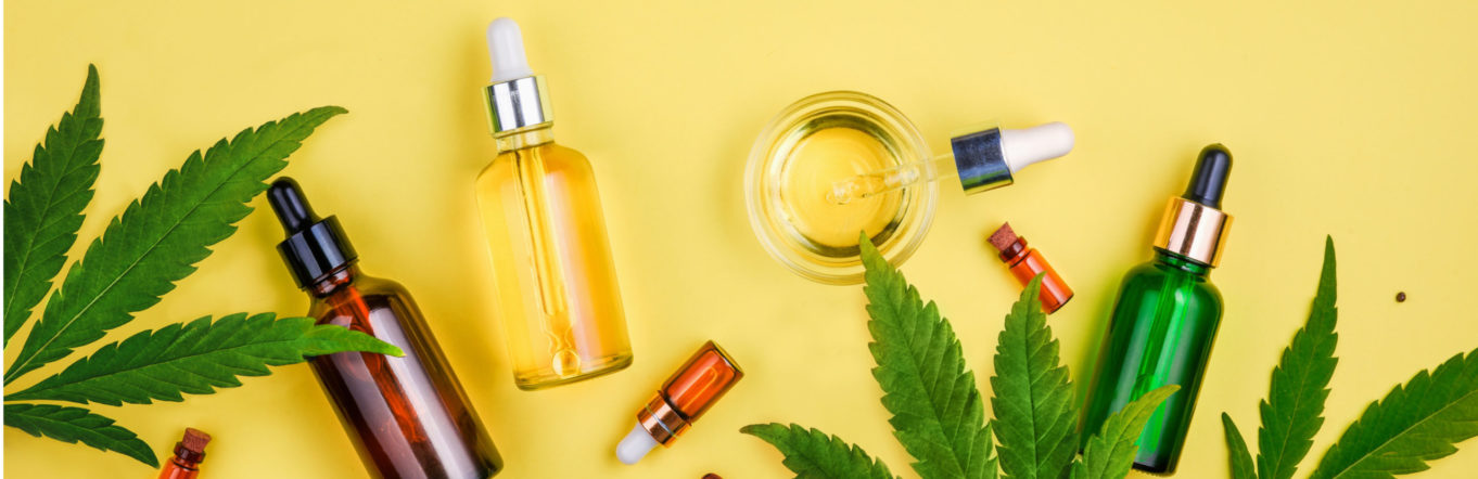 Variety of high-end cannabis products on a yellow background