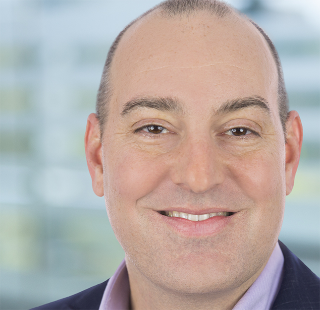 Headshot of smiling man